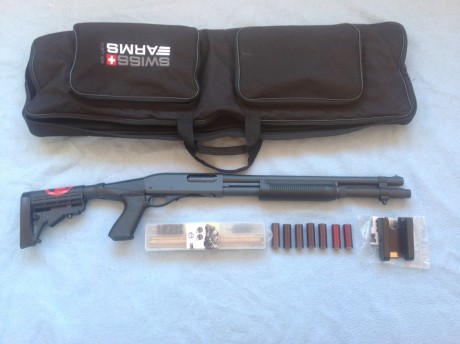 Vendo Remington 870 express magnum con acabado parquerizado. Cañón liso de 45cm. Culata y pistolete táctico 01