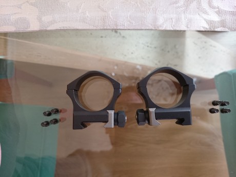 HOLA, VENDO ANILLAS NIGHTFORCE ULTRALITE (ALUMINIO Y TITANIO), PARA VISORES DE 34 MILIMETROS, TIENEN UNA 00