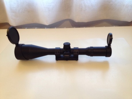 Visor Leapers Accushot 4x16x56 Swat, retícula Mil Dot, con montura y tapas abatibles. En venta por 160€, 00