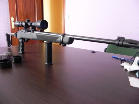 Vendo Ruger 10/22 culata plegabe Butler Creek, impecable con la culata original de madera, impecable ni 00