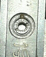 Hola tengo una problema y es que con el alza micrométrica esta firmemente apretada pero  el tornillo que 61