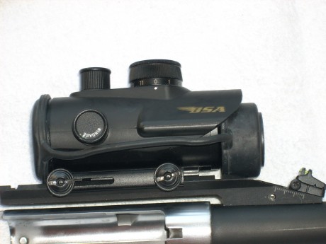 Hola vendo mis escopeta marca HTSAN, modelo escort slug combo, calibre 12,con  DOS cañones, el cañón de 01