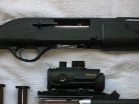 Hola vendo mis escopeta marca HTSAN, modelo escort slug combo, calibre 12,con  DOS cañones, el cañón de 00