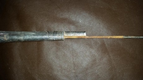 Hola buenas tardes.  Esta pistola esta en casa desde hace muchos años.  Algún sabe que puede ser?  Es 50
