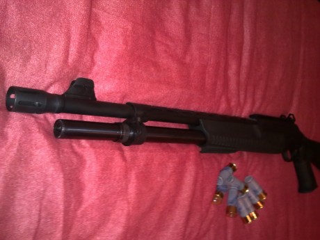   Hola Chic@s!

Vendo mi Hatsan MP táctica de corredera, calibre 12/76 (12 Magnum - capacidad 7+1) con 01