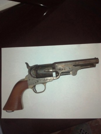 pues eso vendo revolver de avancarga,el modelo no se muy bien cual es, es de cañon octogonal y de calibre 01