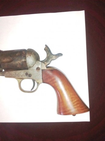 pues eso vendo revolver de avancarga,el modelo no se muy bien cual es, es de cañon octogonal y de calibre 00