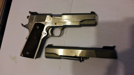 Vendo mi Pistola SPRINGFIELD ARMONI 1911 con sus cuatro calibres los carros de 9mm para y 45 ACP son orijinales 01