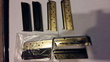Vendo mi Pistola SPRINGFIELD ARMONI 1911 con sus cuatro calibres los carros de 9mm para y 45 ACP son orijinales 10