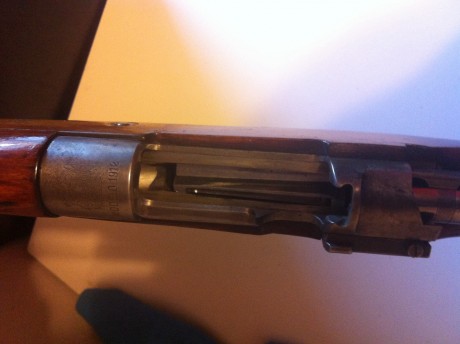 Cambio Mauser 7x57 modelo 1912 fabricado en Austria por henry survival rifle nueva o una usada ajustando 11