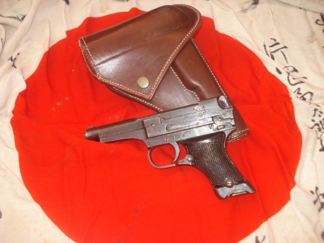 hola cambiaria esta magnifica pistola japonesa nambu 94 fabricada en mayo de 1944,inutilizada, solo taponada 02