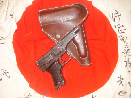 hola cambiaria esta magnifica pistola japonesa nambu 94 fabricada en mayo de 1944,inutilizada, solo taponada 01