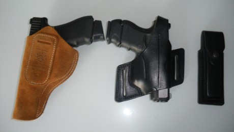 SE VENDE:

1)Funda de cuero negra diestro marca G DIAZ, nueva nunca usada, es tipo bikini y puede utilizarse 01