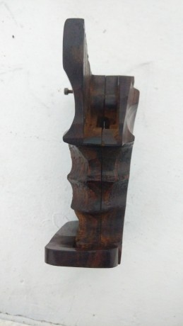 hola vendo unas cachas seminuevas de madera de cocobolo para revolver armazon K o L su estado es impecable 01