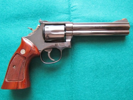 Hola! Buenas tardes! 

Pongo a la venta mi revolver smith & wesson 586 en pavón del calibre 357 magnum 02