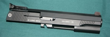 Hola a todos.
Me gustaría si alguien me pudiera dar información sobre esta conversión de la pistola STI 61