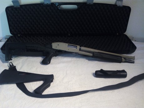 Buenas tardes, pongo a  la venta esta preciosa escopeta Mossberg 500 ATP. La escopeta esta customizada 02