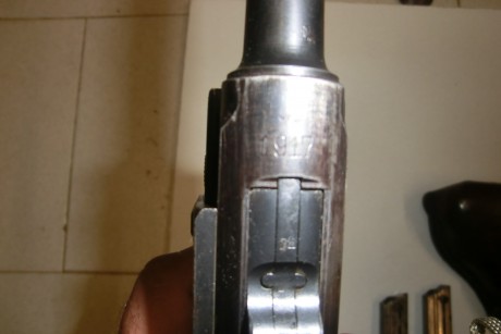  CIMG2950.JPG 
 CIMG2949.JPG 
 CIMG2951.JPG 

Vendo una pistola P08 del ejército alemán. Particularmente 00
