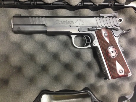 Compañero de tiro me pide que ponga en venta su pistola STI, modelo Trojan en calibre
45 y 6 pulgadas 01