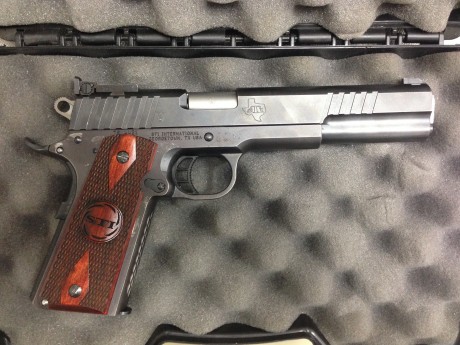 Compañero de tiro me pide que ponga en venta su pistola STI, modelo Trojan en calibre
45 y 6 pulgadas 00