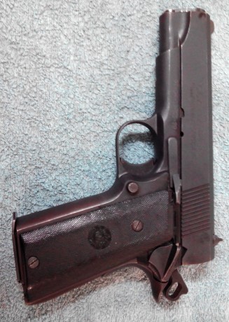 Un amigo me ha pedido que le anuncia su Llama Max II del 9mm parabelum, con un cargador.

Se encuentra 01