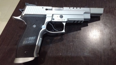 Hola a tod@s,

Se vende Sig Sauer X-Five "X-Short ported" del Mastershop de Sig Sauer, solo 01
