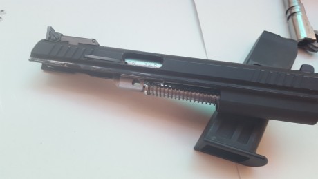 Buenas se vende tanfoglio limited del 38 con un cañón del 9X19 tres cargadores un kit del 22lr con un 01