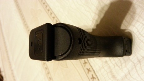 Estado impecable, no mas de 150 disparos,desconector de 2 kg, tapa de empuñadura y funda de polímero nivel 60