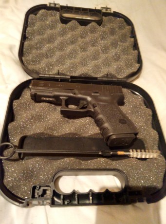 Cambio glock 19 3GEN, con DPM antirretroceso metálico que costó 65 €, con un cargador y maletín. El arma 01