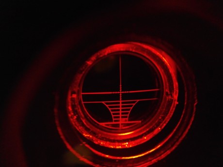 Cambio mira telescópica iluminada rojo/verde es china aunque ponga Bushnell, esta bien para rifles de 00
