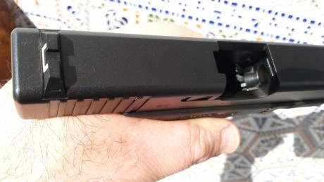 Estado impecable, no mas de 150 disparos,desconector de 2 kg, tapa de empuñadura y funda de polímero nivel 70