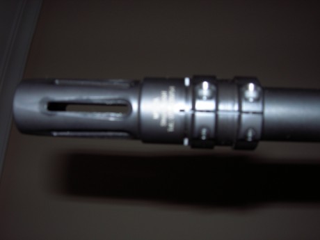 Hola, voy a comprar un AR15 cal.22 de S&W de los que no trae bocacha apaga llamas y por estética me 21
