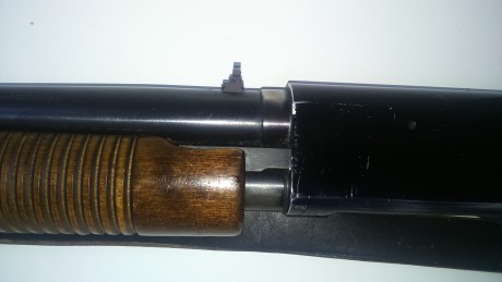 Cambio escopeta de corredera Mossberg 500 calibre 12 por pistola 9 mp Da/Sa. La escopeta esta en Madrid. 01