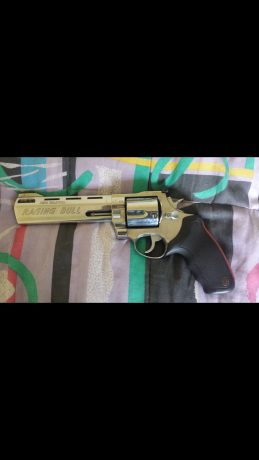 Se vende revolver taurus modelo raging bull  cromado.de 6 pulgadas calibre 454 casull.precio 650 euros. 01