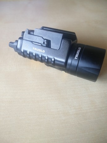 Modulo de laser y linterna marca truglo para carril weaver o picatinny, 6 meses de uso y ha dejado de 02