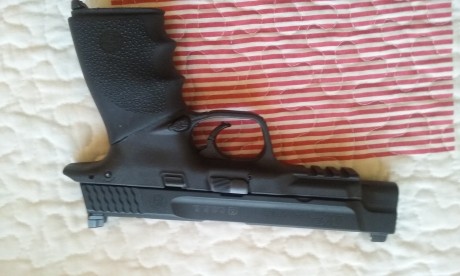 Hola vendo SMITH AND WESSON MP9 PRO CORE DEL AÑO 2014 , CON SOLO 1 TIRADA DE IPSC , UNA FUNDA SUPER GHOST 01