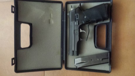 Muy buenas, cambió esta astra A80 del 9mm, guiado en F por un revolver del 38 special 4", por falta 02