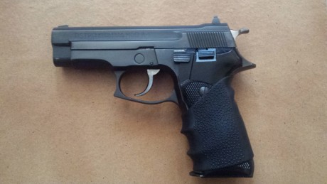 Muy buenas, cambió esta astra A80 del 9mm, guiado en F por un revolver del 38 special 4", por falta 00