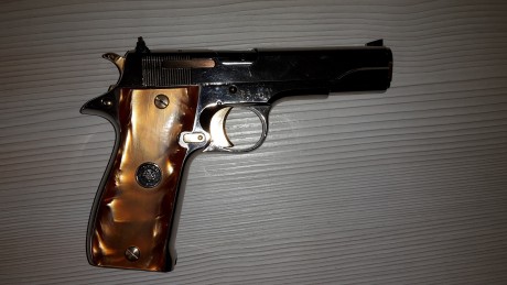 Se vende star s, hecha de encargo, en cromo brillo con los mandos bañados en oro y cachas de nacar, con 01