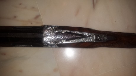 Extraordinaria arma de lujo,con maderas seleccionadas y grabados sublimes.Practicamente sin uso y en perfecto 161