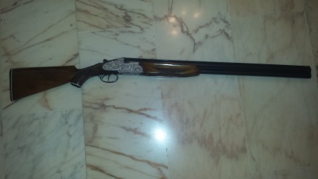 Extraordinaria arma de lujo,con maderas seleccionadas y grabados sublimes.Practicamente sin uso y en perfecto 160