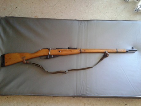 El Mosin-Nagant ..
es un rifle militar accionado por cerrojo, con cargador de cinco proyectiles, que 132