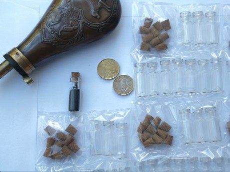 Buscando botes para llevar las dósis de pólvora, me encontré en ebay con unas botellitas de cristal y 50
