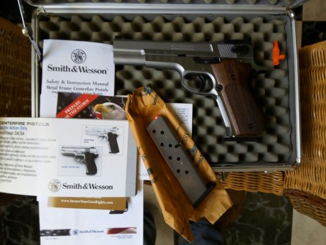 Hola, vendo Pistola S&W 952-2 Inox. 5" Performance Center, en impecable estado, con todos sus 10
