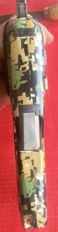 Sig Sauer P-228 al SO, 
-Cachas E2 grips.
-sistema de disparo SRT
-Mira de fibra.
-Tres cargadores.
-Acabado 02