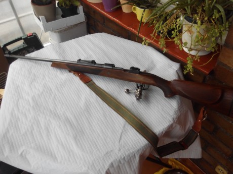 Buenas tardes.

Un fusil español transformado para caza,sus características son:
-Cañón torneado quitando 02