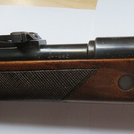 Buenas tardes.

Un fusil español transformado para caza,sus características son:
-Cañón torneado quitando 11