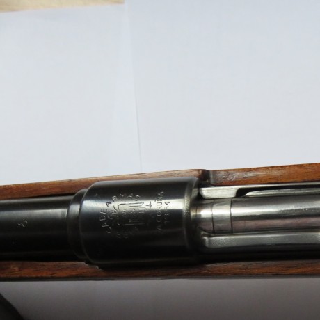Buenas tardes.

Un fusil español transformado para caza,sus características son:
-Cañón torneado quitando 10