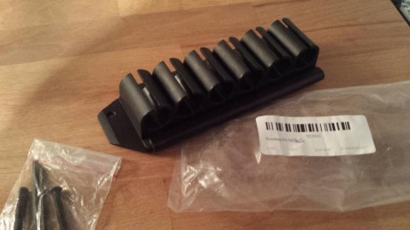 Vendo canana táctica para mossberg 550 o 590... de 6 cartuchos y es extraible ..... viene con tornilleria 00