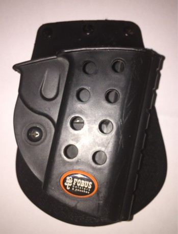 Se vende magnífica funda de polímero, del fabricante FOBUS, modelo REVOLUTION, para pistolas 1911 con 00
